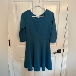 Turquoise 3/4 sleeve Francesca’s Dress with Bow Detail in Back, size: women’s M